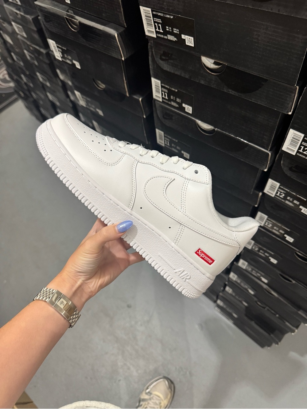 Nike Men’s White Low-Top Sneakers with Red Supreme Tab